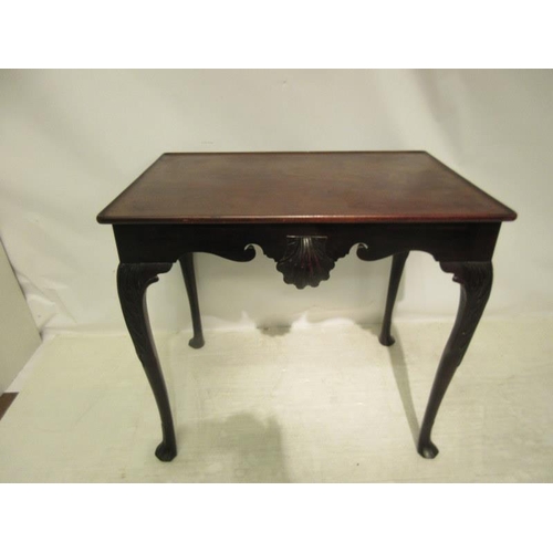 145 - A fine 18th century Irish walnut two sided silver or tea table, the rectangular top over shaped apro... 