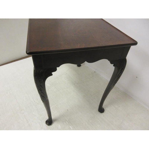 145 - A fine 18th century Irish walnut two sided silver or tea table, the rectangular top over shaped apro... 