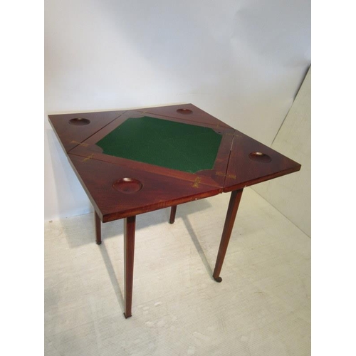 149 - Edwardian inlaid mahogany envelope card table fitted with a drawer and raised on tapered legs.