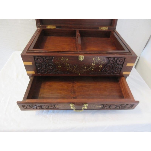 15 - A modern decorative carved wood box with brass inlay.
W. 46cm, D. 30cm, H. 27cm approx.