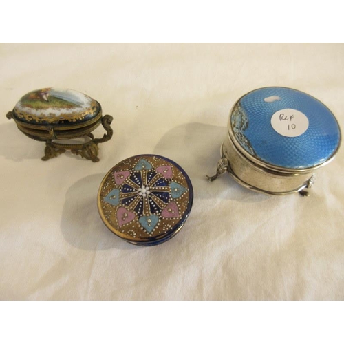 162 - A Birmingham silver circular box with enamel top (some damage), a porcelain & gilded oval shaped cas... 