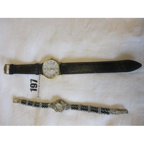 197 - A gents longines Quartz wrist watch with calendar appeture and a ladies Morita Quartz. (2)