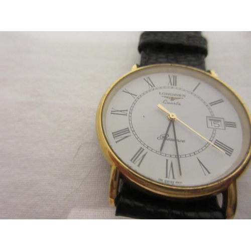 197 - A gents longines Quartz wrist watch with calendar appeture and a ladies Morita Quartz. (2)