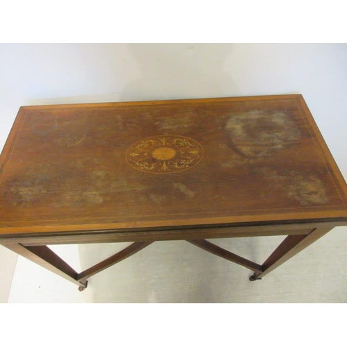 2 - An Edwardian inlaid rosewood card table, the rectangular folding top with satinwood banding raised o... 