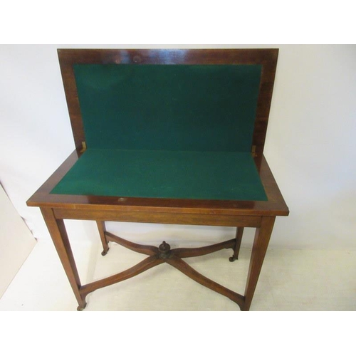 2 - An Edwardian inlaid rosewood card table, the rectangular folding top with satinwood banding raised o... 