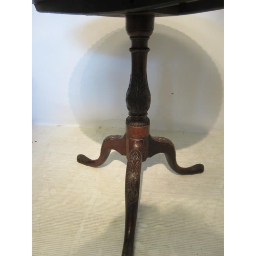 220 - A good antique mahogany wine table, the circular top with rope edge decoration raised on carved cent... 