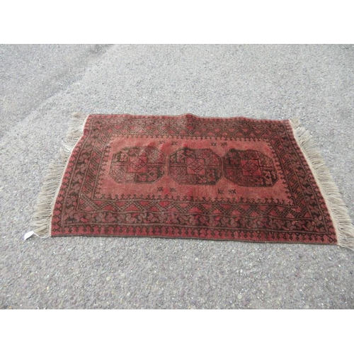 223 - Bokhara style rug. 120cm x 80cm approx.