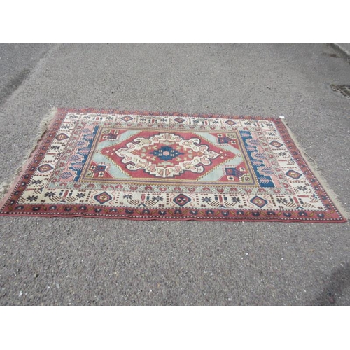 224 - Persian style rug. 201cm x 128cm approx.