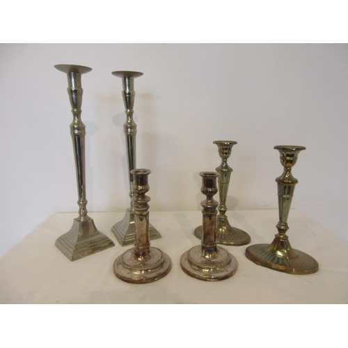 27 - Three pairs of plated candlestick & a entree dish.