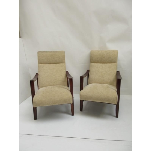 35 - A pair of easy lounge chairs.