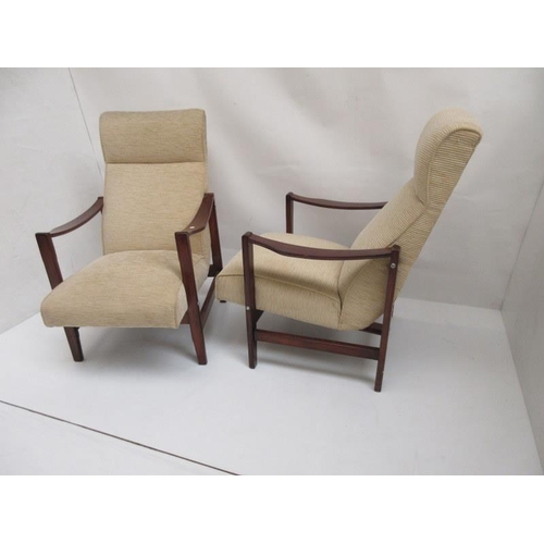 35 - A pair of easy lounge chairs.