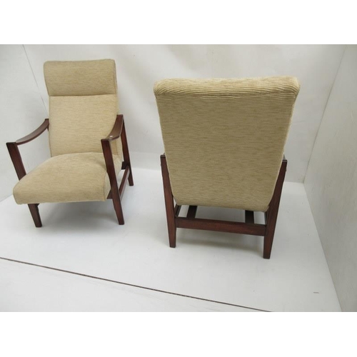 35 - A pair of easy lounge chairs.