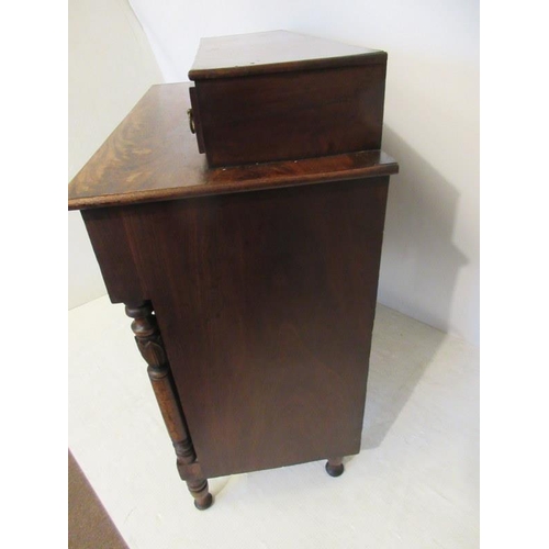 42 - A mid 19th century mahogany chest of four short & three long drawers having tulip capped side column... 