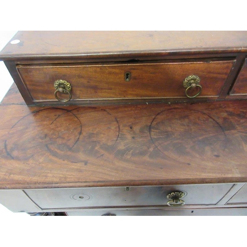 42 - A mid 19th century mahogany chest of four short & three long drawers having tulip capped side column... 