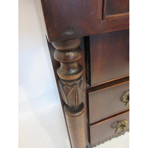 42 - A mid 19th century mahogany chest of four short & three long drawers having tulip capped side column... 