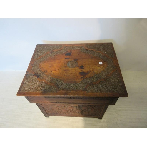 50 - A decorative carved wood lift top occasional table. (possibly Indian) W. 51, D. 39cm, H. 43cm approx... 