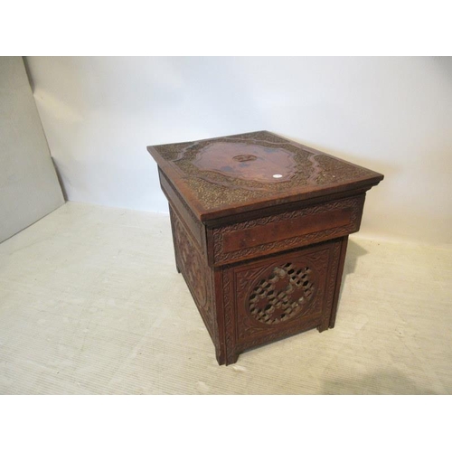 50 - A decorative carved wood lift top occasional table. (possibly Indian) W. 51, D. 39cm, H. 43cm approx... 