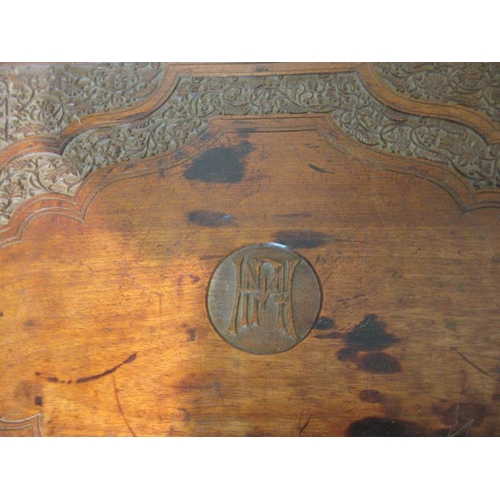 50 - A decorative carved wood lift top occasional table. (possibly Indian) W. 51, D. 39cm, H. 43cm approx... 