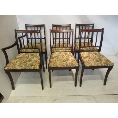 53 - A set of six mahogany dining chairs, the backs with reeded upright bars, four singles and two carver... 