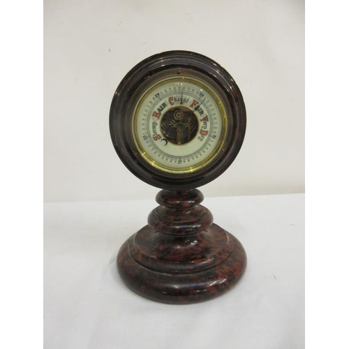 63 - Marble cased circular barometer.