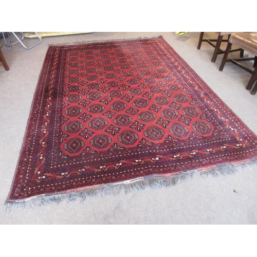 78 - Large old Bokhara style rug. 290cm x 207cm approx.