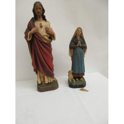 8 - Two religious statues.