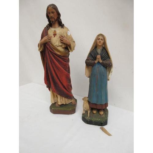 8 - Two religious statues.