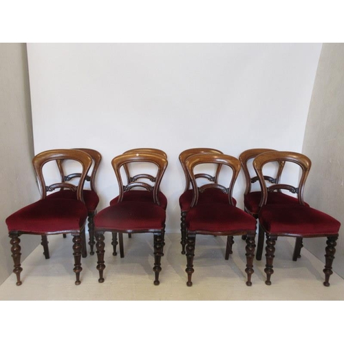 80 - A set of 8 Victorian mahogany dining chairs raised on turned legs. - (good colour)