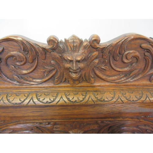 84 - Good antique carved oak monks bench with lift up seat. W. 120cm, D. 48cm, H. 100cm approx.