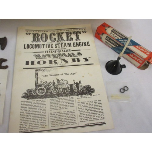 213 - A good Stephensons Rocket with its original box by Hornby, this is a working model which runs on ste... 