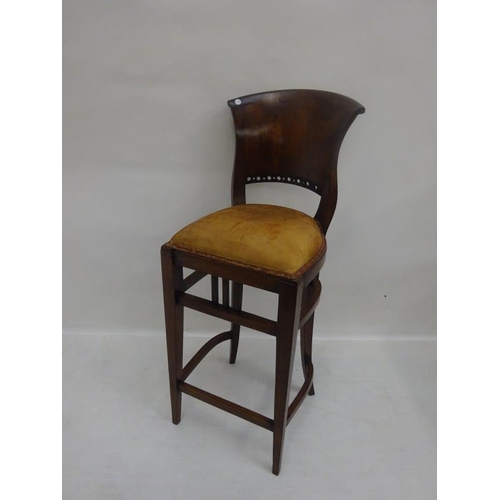 12 - A tall walnut framed stool with curved back. H. 111cm approx.