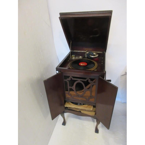 23 - Old Crescendo cabinet gramophone and a quantity of records.