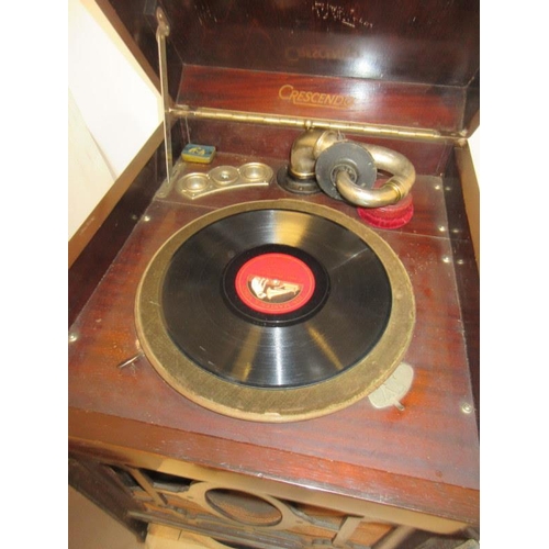 23 - Old Crescendo cabinet gramophone and a quantity of records.