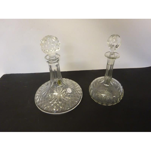 34 - A Waterford glass ships decanter and stopper and a Victorian decanter and stopper. (2)