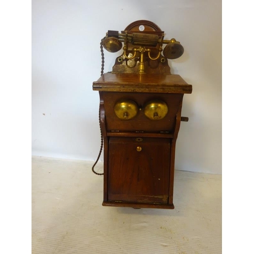 39 - Interesting old wall mounted telephone, very complete.