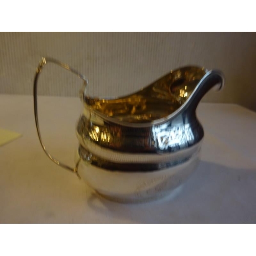 427 - Irish Georgian silver cream jug, marks worn.