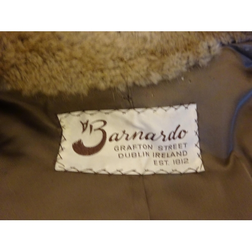 54 - Ladies fur coat from Barnardo's Graffton St., Dublin. Some damage (see photos) Length 120cm approx.