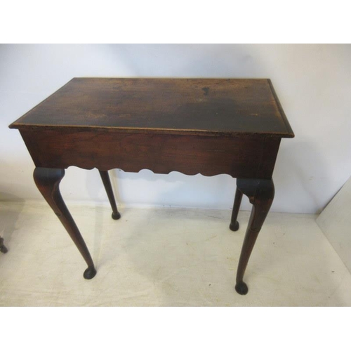 57 - Neat sized antique oak table having carved freize and sides and raised on four pad feet. W. 73cm, D.... 