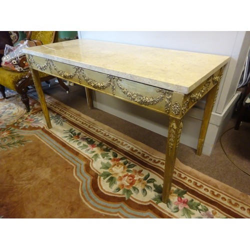 437 - Decorative gilt wood side table having a granite top and raised on tapered legs. W. 137cm, D. 60cm, ... 