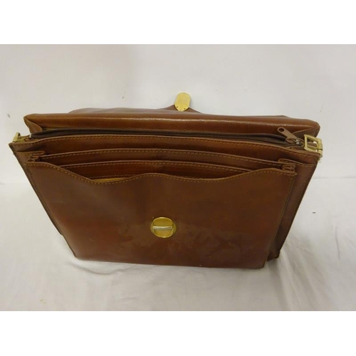 106 - Good quality leather briefcase.