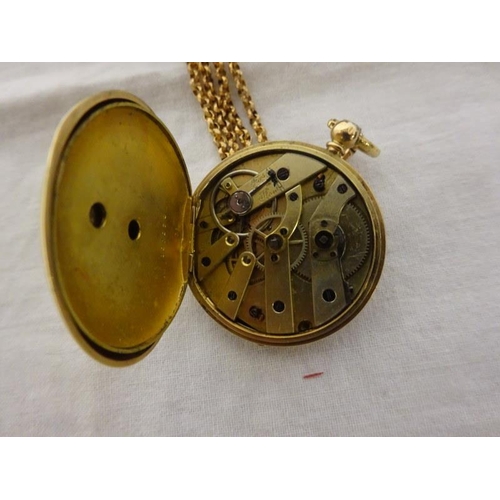 165 - 14ct gold key wind pocket watch and chain.