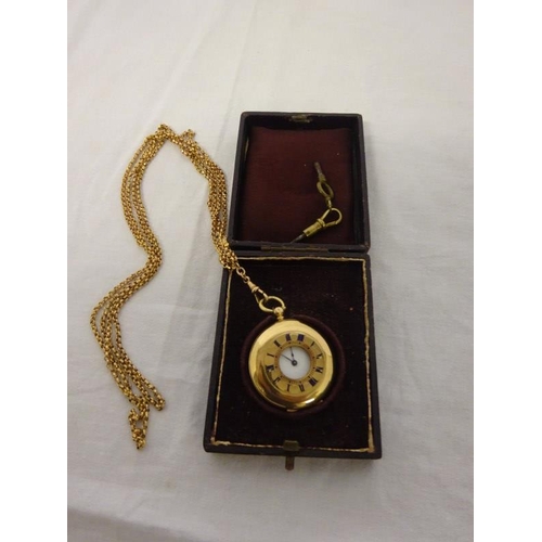 165 - 14ct gold key wind pocket watch and chain.