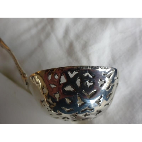 168 - A mid 20th century Italian sterling silver sifter ladle.