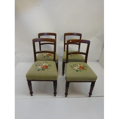 170 - A set of four 19th century mahogany side chairs with needlework upholstery.