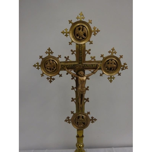 174 - Two part brass crucifix and two brass candle ornaments. (3)