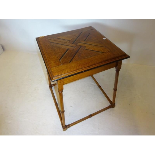 184 - Decorative oak occasional table. 48cm x 48cm