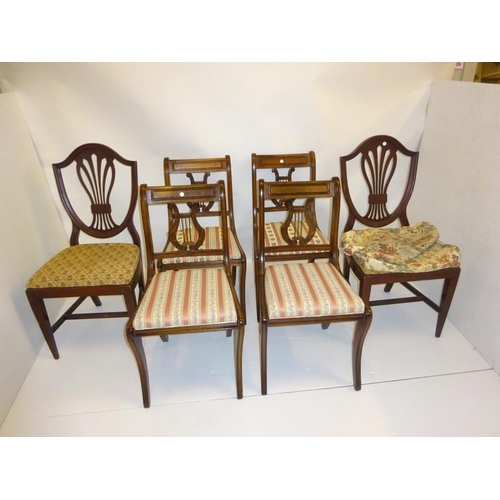 216 - A pair of Hepplewhite style side chairs and four Regency style chairs. (6)