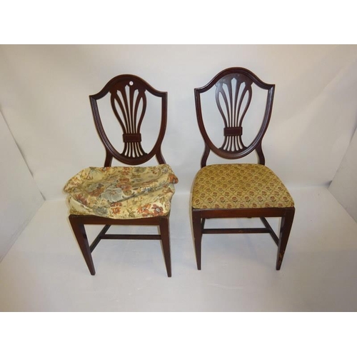 216 - A pair of Hepplewhite style side chairs and four Regency style chairs. (6)