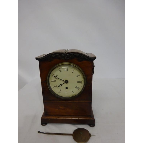 241 - Antique mahogany cased mantle clock with fusee movement.