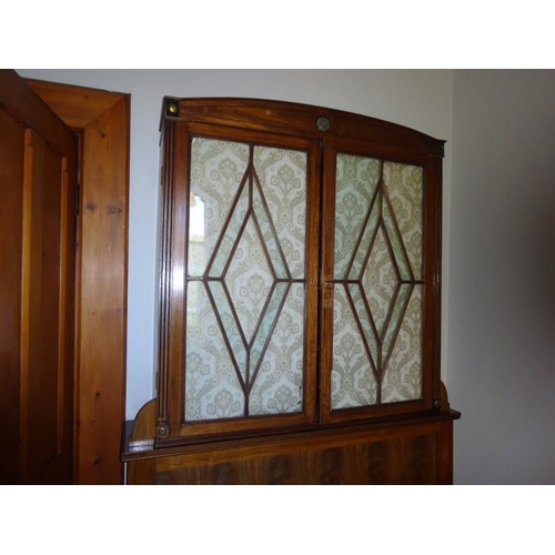 26 - Regency mahogany two door bookcase top having sectioned glass door and shelved interior. W. 110cm, H... 